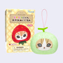 Cat-themed product with packaging and keychain on a light purple background