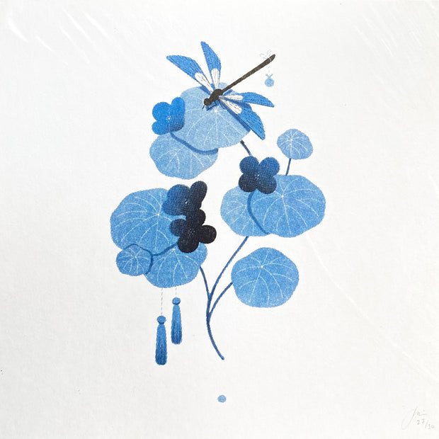 Blue illustration of a dragon fly on top of leaves with flower buds. 2 small ghost puppets hang from the leaves. 