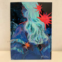 A painting featuring a stylized profile portrait of a woman with long flowing mint and turquoise hair, set against a dark starry background with bright red starburst shapes. The artwork is displayed against a light beige textured wall.