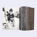 Interior 2 page excerpt, 2 full bleed pages, one of a photo of Margaret squatting down and loading up a paint roller inside an open paint can. Next page is a repeating pattern of white tears on a brown background.