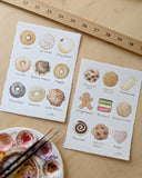 2 watercolor paintings of 9 different types of sweets, with written labels underneath each. One painting is all cookies and the other is all donuts.
