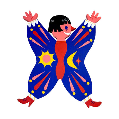 Die cut painted wooden sculpture of a woman, pink skin and short black hair. She smiles excitedly and wears a puffy blue jumpsuit, with her hands and feet extended out to form an "x" with her body. Jumpsuit has shape pattern designs.