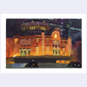 An impressionist-style painting of a grand building at night, rendered in warm orange, yellow, and red tones with dark purple and black shadows, surrounded by a wide white border.