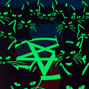 Painting of many black cats with glow in the dark ears, eyes and whiskers. They are all gathered around a hex circle, looking straight at the viewer. Piece is shown glowing in the dark.