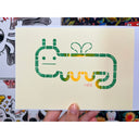 Block print of a worm character with a cartoon face and tiny wings.