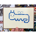 Block print of a worm character with a cartoon face and tiny wings.