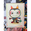 Colorful illustration of a cartoon devil cat.