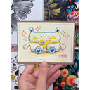 Illustration of a bear character with a flat head and a yellow bow.