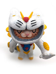 Sculpture of an orange cartoon tabby cat, dressed as a Evangelion style mech, in a white spacesuit with red, yellow and blue accessories. Its hand is extended out, fingers spread.
