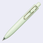 Thick, short mint colored pen with a side clip and a silver pen opening.