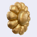 Side view of Murakami plush with gold fabric and a closed eye, smiling expression.