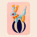 A colorful pastel-style illustration of a balloon dog with orange flower-like accents and a striped black-and-cream vase, centered on a pale pink rounded rectangle with a warm off-white border.