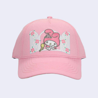 Pink cap with graphic of My Melody looking out a white window with a small yellow bird next to her. 