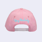 Back of pink cap with embroidered blue font that reads "My Melody" in cursive. Hat has a white snap closure for size adjustment.