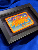 Framed illustration of a cat-shaped vehicle with 'tap' and 'Catbus' text on a white background