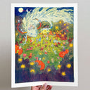 Colorful risograph print of a light green dragon and many small, cute creatures on a grassy field with flowers, dancing around in celebration.