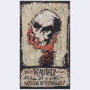 A vertical artwork featuring a stylized skull illustration with distressed paper textures, black outlines, and red painted accents. The bottom section contains the text 'WANTED SKULL OF A HOMO NEANDERTHALUS' in a rough poster-style font.