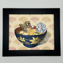 Illustration featuring a dark blue bowl of miso soup with a white multi-tailed fox character on the right and a brown tanuki character on the left, set against a cream background with pink and beige folding fan patterns.