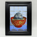 Framed artwork of Godzilla in a bowl of miso soup, so only its head is showing. Background is a light blue gradient with patterns of ships and planes.