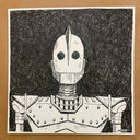 A black and white ink drawing of a robot head and upper torso on a white square sheet, placed against a brown background.