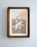 Illustration in muted orange, brown and cream colored tones of a cartoon cat laying on their back in a grass field. Beside them is a small cartoon kitten who holds a frog.