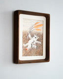 Illustration in muted orange, brown and cream colored tones of a cartoon cat laying on their back in a grass field. Beside them is a small cartoon kitten who holds a frog.