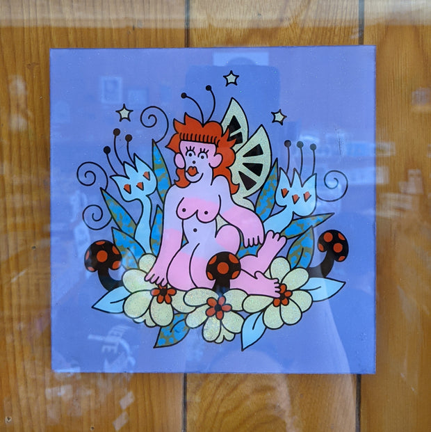 Graphic style illustration on purple paper of a nude pink cartoon style woman with orange hair and antennae and wings like an insect. It sits on a bed of flowers and mushrooms with stars behind.