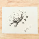 Black ink illustration of a lunging cat, with a ferocious but smiling expression, with many sharp teeth. Small papers fly all around it.