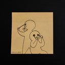 Pen illustration on tan post it with 2 characters pulling their eyes of their heads.