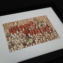 Illustration of many small simplistic characters standing in a large group, around red letters that read Giant Robot. Some robot mascots roam the crowd.