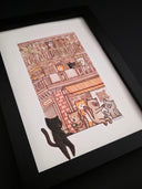 Framed illustration of a building exterior with many floors, each with a balcony. Many cats sit on and around the building, talking with one another.