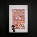 Framed illustration of cats in a cityscape with a black frame.
