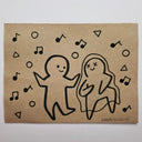 Cartoon-style drawing of a couple with musical notes on brown paper, signed 'Paper Robot'.