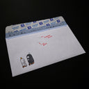White envelope with cartoon characters and text on a black background