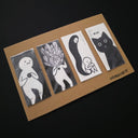 Set of 4 illustrations, black and white of simplistic characters being overtaken by a spirit and a final cat character.