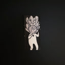 A small black and white drawing featuring a stylized figure holding a flower-like head, centered against a dark black background.