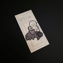 A rectangular drawing of a black line drawing of a simplistic character reading a book, with a pile of cats atop of them. Photographed on a dark black background.