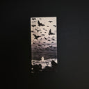 A vertical drawing depicting a flock of birds flying over a landscape with a small figure at the bottom, displayed against a solid black background.