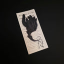 A drawing of a simplistic small character with large black plumes of smoke coming out of its chest.