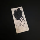 A rectangular drawing on a Nutritional Facts label of a simple character with large plumes of black smoke coming out of its chest and eyes.