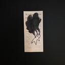 A rectangular drawing on a Nutritional Facts label of a simple character with large plumes of black smoke coming out of its chest and eyes.