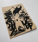 Brown kraft paper with black abstract illustration on a white background