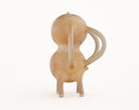Brown ceramic sculpture of a character with a rounded body, small eyes and ears and mug handle like shapes coming out of its sides and back.