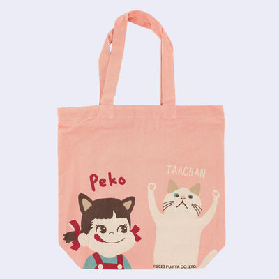 Pink tote bag featuring 2 illustrations at the bottom. One is Peko, a small girl in red overalls with pigtails tied in red ribbons and cat ears. The other is a white cat. "Peko" is written above the girl and "Taachan" above the cat.