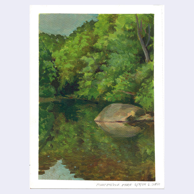 Plein air painting of a lake with a large rock in it, lined with very lush trees and greenery.