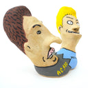 Ceramic sculpture of Beavis and Butthead, seen only from the shoulders up and fused together at the shoulder. 