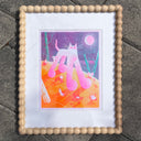 Risograph print of a pink and white cat with giant paws and very large legs, seen from slightly under. It walks on orange ground with tiny characters running alongside it.