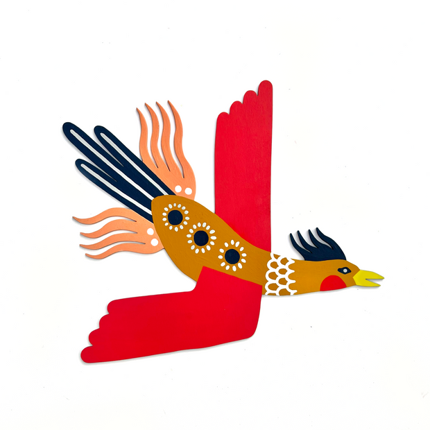 Die cut, brightly painted wooden sculpture of a bird, which looks like a brown duck with bright red wings and wild phoenix like tail feathers, navy blue and peach color.
