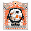 Ink illustration with orange color accents of a large cat wearing a black baseball cap and holding 2 dolls, one is a daikon creature and the other is a robot. It plays in front of a mini town with GR1 at GR2 and small dolls of the staff. Piece is elaborately framed like a play or theater.