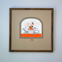 Framed artwork with a beige fabric mat. Artwork is an Ink illustration of a woman in a dress holding an uprooted stalk of flowers a long orange ribbon, brought to her by a blackbird. Behind her is a dragon.